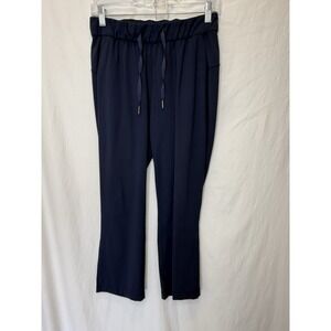 Lululemon On the Fly Crop *Woven 23" in‎ Navy Blue Size 4 MSRP $98 Drawstring